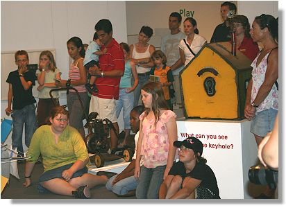 Young artists and their families attending the launch ceremony of the Ecotourism Puzzle Map.